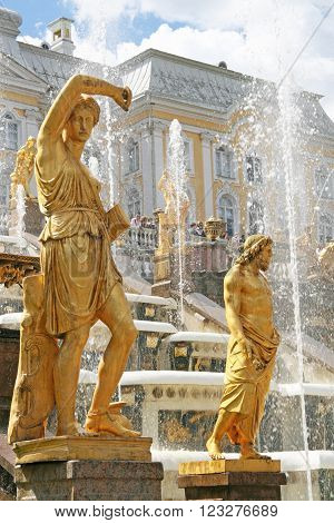 Peterhof, Russia - June 27, 2008: Gold Plated Sculptures By Fountains Grand Cascade In Pertergof, Sa