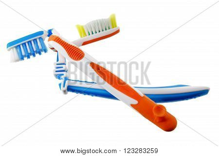 Used Broken Toothbrushes on Isolated White Background