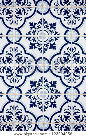 Blue pattern detail of Portuguese glazed ceramic tiles.