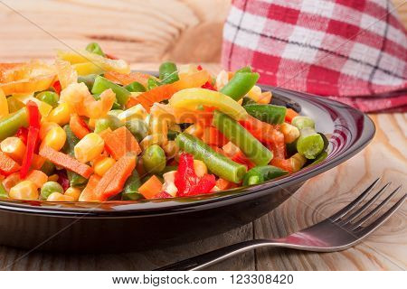 Mexican Mix of Vegetables. Tomatoes, Beans, Celery Root, Green Beans, Peas, Corn. Dietary Food.