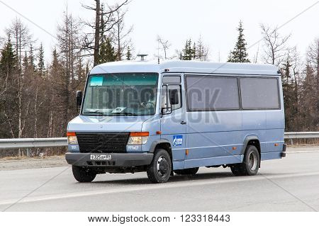 NOVYY URENGOY, RUSSIA - MAY 23, 2014: Blue passenger van Mercedes-Benz Vario the city street.