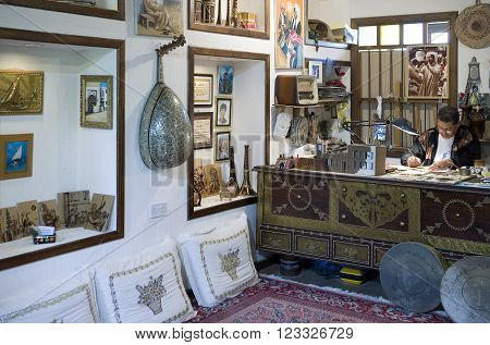 Al Jasra, Bahrain - December 11 2006: Artisans at work in the Traditional Craft Center.