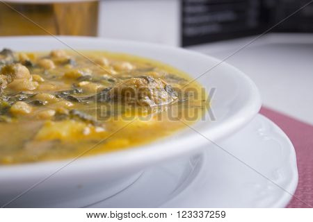 Pottage. Dish on restaurant table. No people