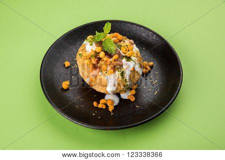 Rajasthani Shahi Raj Kachori, stuffed katchori with potato and sprout filling and served with curd, chutney and sev
