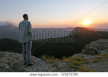 Bearded Man In Jeans Looking At The Sunset In The Mountains Soltse