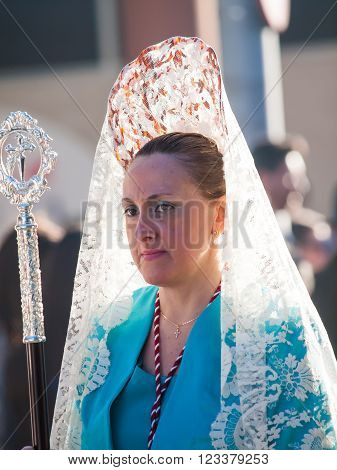Algeciras Spain - 20 March 2016 Female participant at Palm Sunday Procession in. The woman carries the traditional head coverage called mantilla