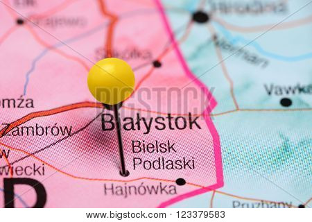 Photo of pinned Bielsk Podlaski on a map of Poland. May be used as illustration for traveling theme.
