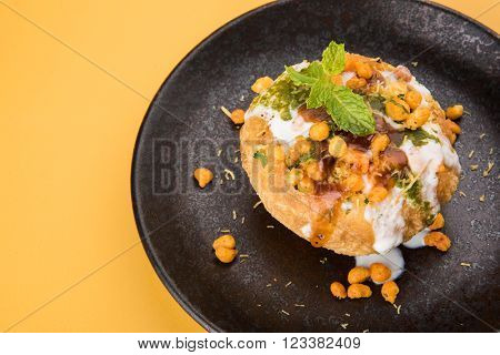 Rajasthani Shahi Raj Kachori, stuffed katchori with potato and sprout filling and served with curd, chutney and sev