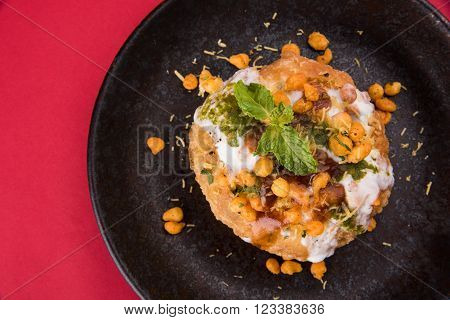 Rajasthani Shahi Raj Kachori, stuffed katchori with potato and sprout filling and served with curd, chutney and sev