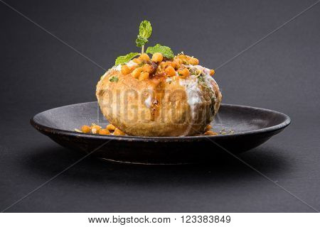 Rajasthani Shahi Raj Kachori, stuffed katchori with potato and sprout filling and served with curd, chutney and sev