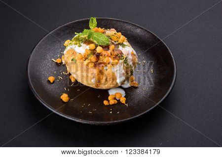 Rajasthani Shahi Raj Kachori, stuffed katchori with potato and sprout filling and served with curd, chutney and sev