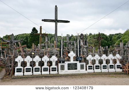 Cca 12 km north of the city of SIAULIAI / LITHUANIA - July 24 2013: Close view of the Hill of Crosses a place of worship for Christians