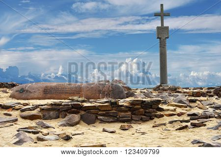 CAPE CROSS NAMIBIA - JAN 31 2016: A memorial stone for Diogo Cao who landed at this spot in 1485 and who erected a stone cross or padrao at this spot