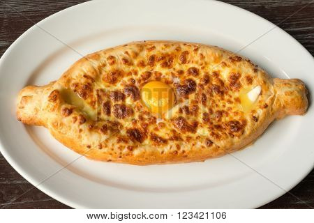 Khachapuri, raditional Georgian cheese-filled bread Ajarian style