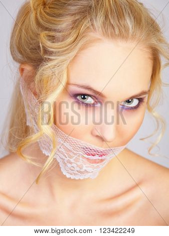 sensual girl with lace mask on the mouth