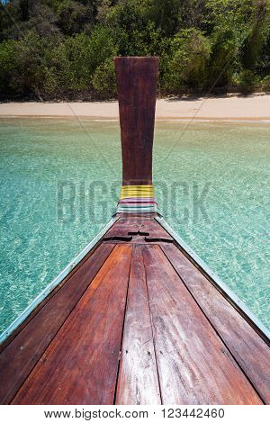 Thai Wooden Head Longtail Boat Heads Toward