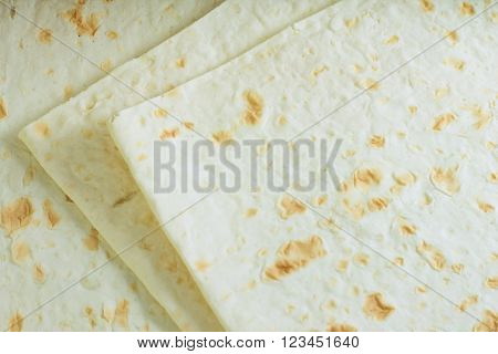 Lavash textire. Thin armenian bread, Wheat flatbread, greek pita, indian chapati or spanish tortilla