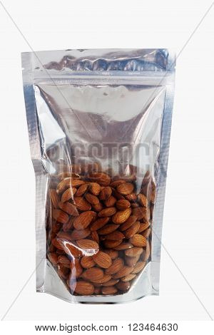 Almond in packaging foil zip lock bag. Isolated on white with clipping paths.