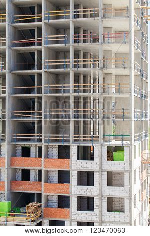 Monolithic frame construction of the building. Solid walls of concrete. Formwork for walls made of concrete. Construction of the building. Masonry walls and aerated concrete masonry walls