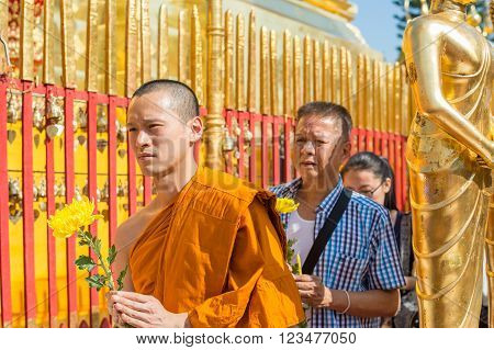 CHIANG MAI, THAILAND - FEBRUARY 5: Thai people worship at Wat Phra That Doi Suthep on February 5, 2016 in Chiang Mai. This Buddhist temple founded in 1383 is the most famous in Chiang Mai.