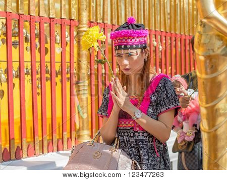CHIANG MAI, THAILAND - FEBRUARY 5: Thai people worship at Wat Phra That Doi Suthep on February 5, 2016 in Chiang Mai. This Buddhist temple founded in 1383 is the most famous in Chiang Mai.