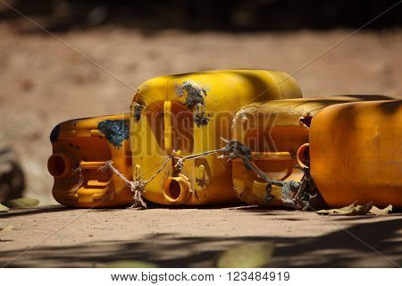 Empty water cans at a well in Africa.