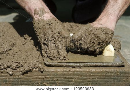 Handicrafts. Preparation Of Mud Bricks In The Plate