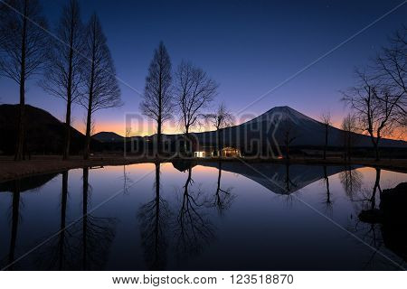 Sunrise landscape view with reflection of Fuji mountain in morning.