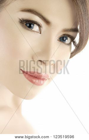 Beauty shot or head shot of asian female model with proper makeup in her face
