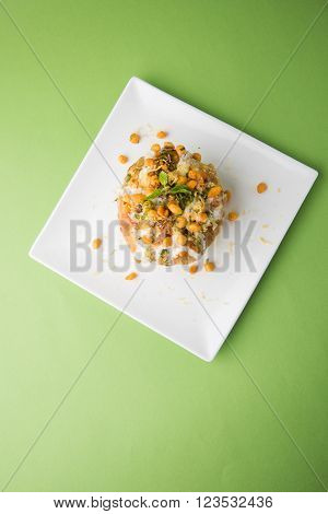 Rajasthani Shahi Raj Kachori, stuffed katchori with potato and sprout filling and served with curd, chutney and sev