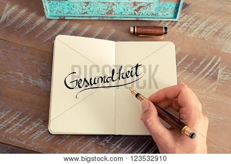 Handwritten Text In German "gesundheit"  - Translation : Health