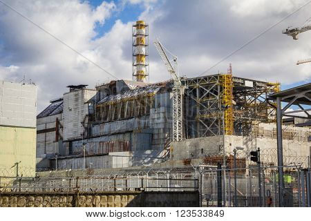 UKRAINE, PRYPIAT - MARCH 19, 2016: Chernobyl Nuclear Power Plant and shelter facility. Front view