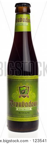 GRONINGEN, NETHERLANDS - MARCH 24, 2016: Belgian black IPA beer Troubadour Westkust isolated on a white background