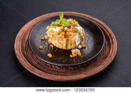 Rajasthani Shahi Raj Kachori, stuffed katchori with potato and sprout filling and served with curd, chutney and sev