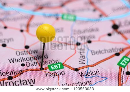 Photo of pinned Kepno on a map of Poland. May be used as illustration for traveling theme.