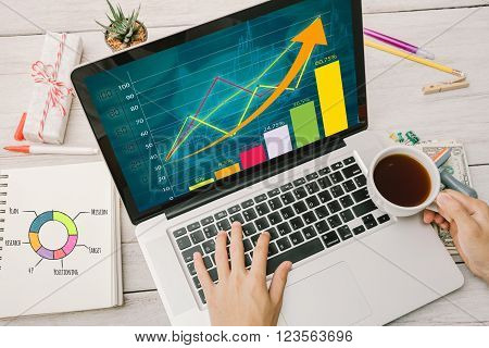 Businessman working with hand holding coffee cup and Strategy Concept.