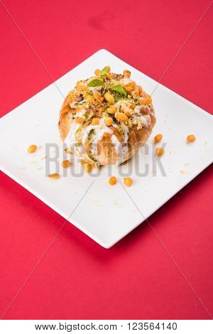Rajasthani Shahi Raj Kachori, stuffed katchori with potato and sprout filling and served with curd, chutney and sev