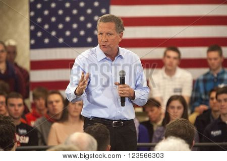 MADISON WI/USA - March 28 2016: Republican presidential candidate John Kasich speaks to a group of supporters during a town hall event before the Wisconsin presidential primary in Madison Wisconsin.