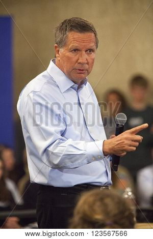MADISON WI/USA - March 28 2016: Republican presidential candidate John Kasich speaks to a group of supporters during a town hall event before the Wisconsin presidential primary in Madison Wisconsin.
