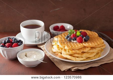 waffles with creme fraiche and berries for breakfast