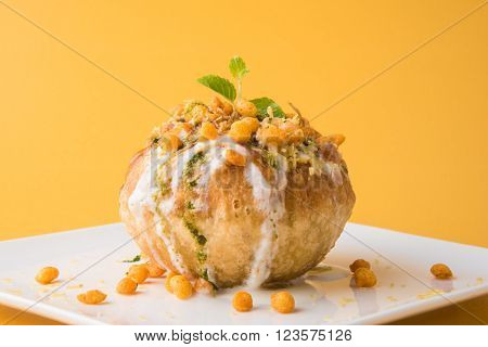 Rajasthani Shahi Raj Kachori, stuffed katchori with potato and sprout filling and served with curd, chutney and sev