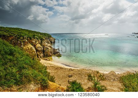 cloudy sky over Alghero shoreline in Sardinia
