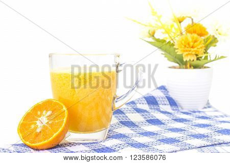 Fresh Orange Juice Smoothie Dirnk In Glass On Blue Mat