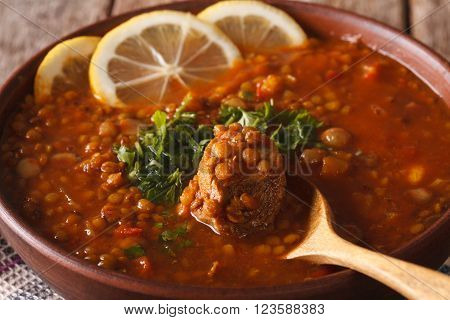 Moroccan soup Harira in a bowl macro. Horizontal