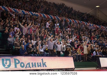 SAMARA RUSSIA - NOVEMBER 06, 2013: Fans and spectators enjoyed on the stand during the BC Krasnye Krylia and BC Royal Hali Gaziantep basketball game on November 06 2013 in Samara Russia.