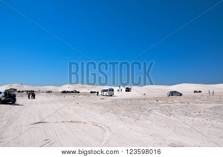LANCELIN,WA,AUSTRALIA-SEPTEMBER 28,2015: People and recreational vehicles at the white sand dunes tourist attraction in Lancelin, Western Australia.