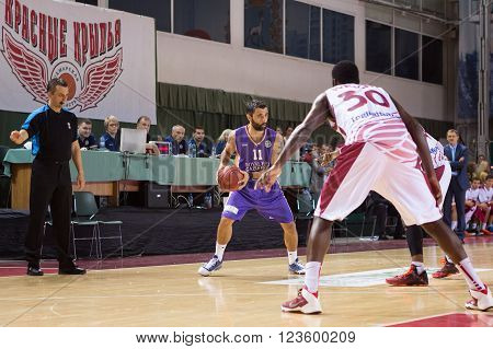 SAMARA RUSSIA - NOVEMBER 06, 2013: BC Royal Hali Gaziantep guard Serkan Erdogan (11) with ball is on the attack during the BC Krasnye Krylia game on November 06 2013 in Samara Russia.