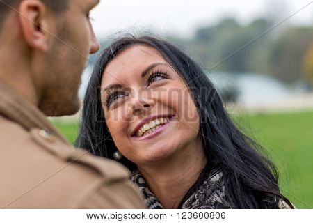 amorous couple in a park