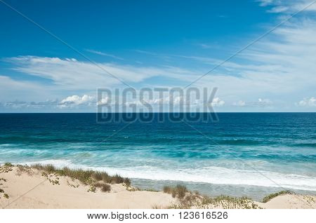 View on Dunes and Indian Ocean tropical beach with waves, Tofo, Mozambique