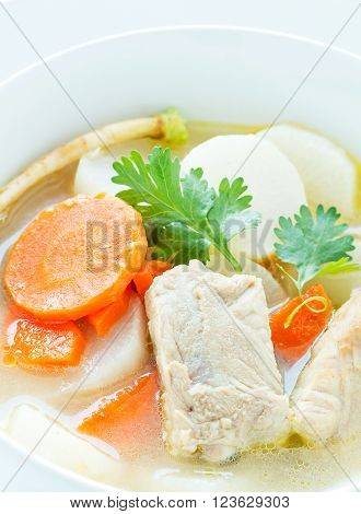 Pork soup and vegetable in a white bowl